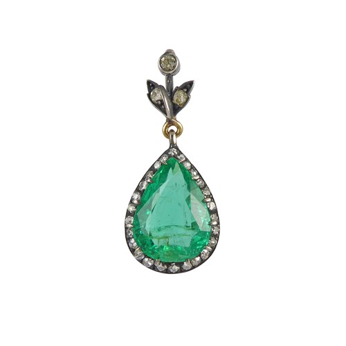 Early 20th century emerald and diamond drop cluster pendant, the facetted pear shaped emerald of approximately 4.75ct,